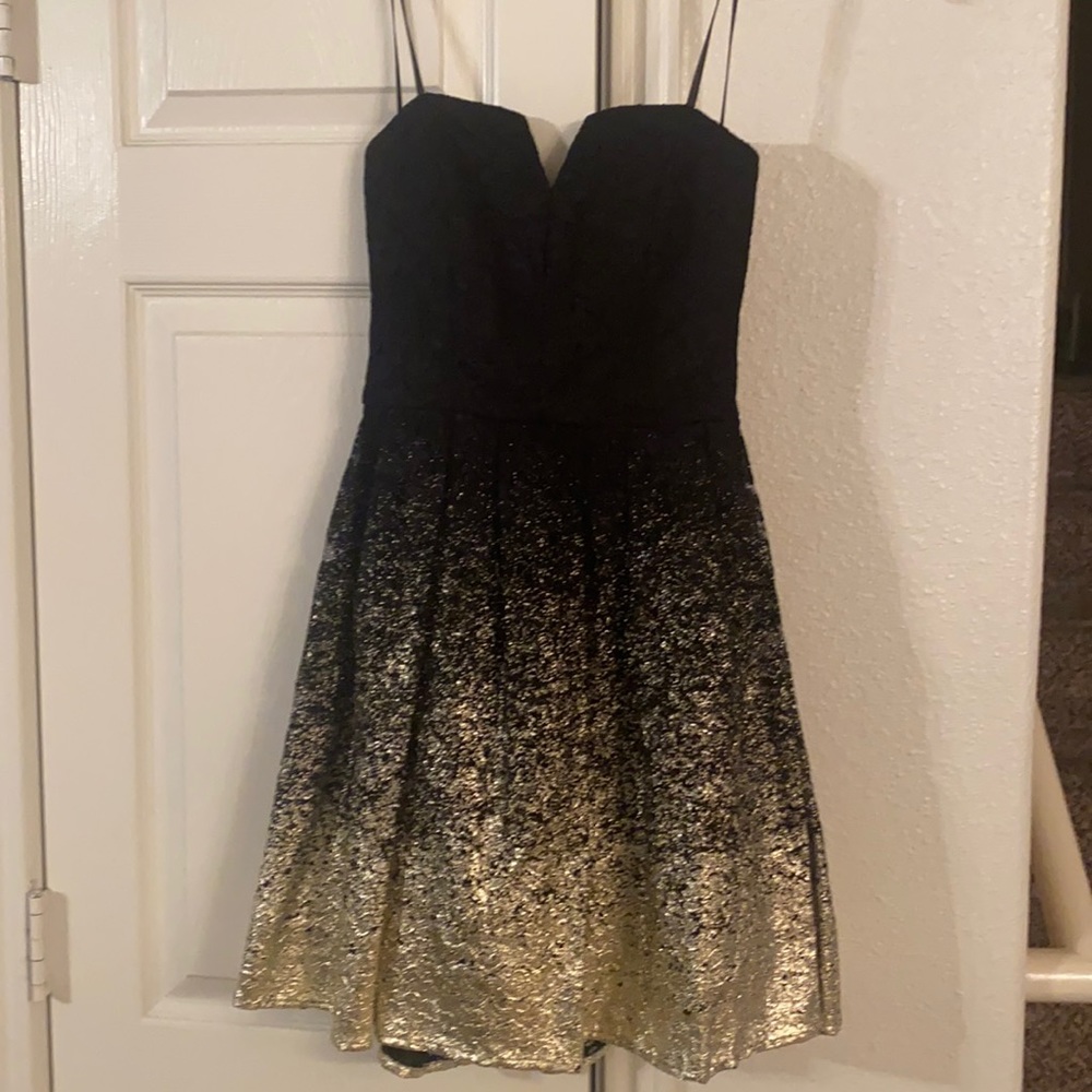 Beautiful black with gold dress size 3/4